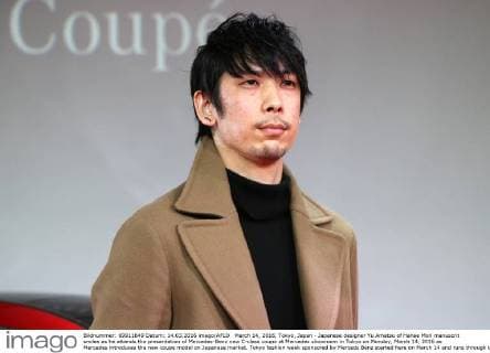 March 14, 2016, Tokyo, Japan - Japanese designer Yu Amatsu of Hanae Mori manuscrit smiles as he attends the presentation of Mercedes-Benz new C-class coupe at Mercedes showroom in Tokyo on Monday, March 14, 2016 as Mercedes introduces the new coupe model on Japanese market. Tokyo fashion week sponsored by Merceds Benz started here on March 14 and runs through to the 19th.  (lwxa000291)