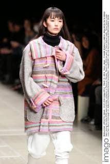March 14, 2016, Tokyo, Japan - A model displays a creation designed by ha-ha design team during the haha 2016 autumn winter collection in Tokyo on Monday, March 14, 2016 as part of Tokyo fashion week. Tokyo fashion week runs from March 14 through 19.  (lwxa000297)