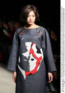 March 14, 2016, Tokyo, Japan - A model displays a creation designed by ha-ha design team during the haha 2016 autumn winter collection in Tokyo on Monday, March 14, 2016 as part of Tokyo fashion week. Tokyo fashion week runs from March 14 through 19.  (lwxa000313)