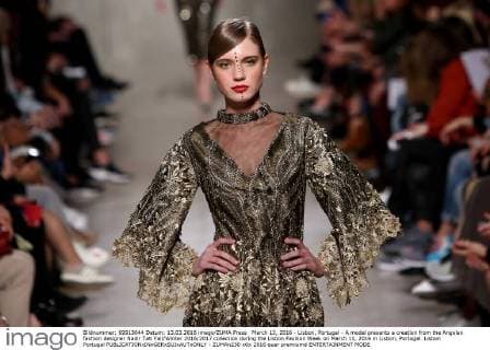 March 13, 2016 - Lisbon, Portugal - A model presents a creation from the Angolan fashion designer Nadir Tati Fall Winter 2016 2017 collection during the Lisbon Fashion Week on March 11, 2016 in Lisbon, Portugal. Lisbon Portugal  - ZUMAn230
