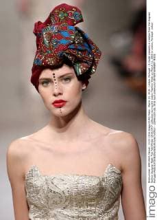 March 13, 2016 - Lisbon, Portugal - A model presents a creation from the Angolan fashion designer Nadir Tati Fall Winter 2016 2017 collection during the Lisbon Fashion Week on March 11, 2016 in Lisbon, Portugal. Lisbon Portugal  - ZUMAn230