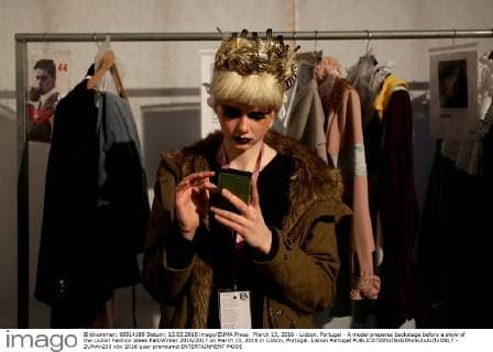 March 13, 2016 - Lisbon, Portugal - A model prepares backstage before a show of the Lisbon Fashion Week Fall Winter 2016 2017 on March 13, 2016 in Lisbon, Portugal. Lisbon Portugal  - ZUMAn230