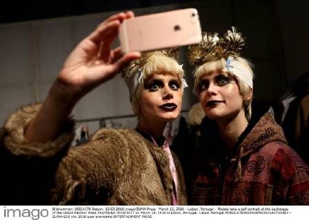 March 13, 2016 - Lisbon, Portugal - Models take a self portrait at the backstage of the Lisbon Fashion Week Fall Winter 2016 2017 on March 13, 2016 in Lisbon, Portugal. Lisbon Portugal  - ZUMAn230