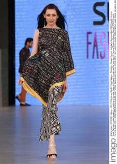 Pakistan : Depak Perwani s designs showcased in PFDC Sunsilk Fashion Week Pakistani model presents creations of famous designer Depak Perwani on the last day of Pakistan Fashion Design Council (PFDC) Sunsilk Fashion Week 2016.  RanaxSajidxHussain