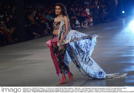 Pakistan : Gul Ahmed s designs showcased in PFDC Sunsilk Fashion 2016 Pakistani model presents creations of famous designer Gul Ahmed on the last day of Pakistan Fashion Design Council (PFDC) Sunsilk Fashion Week 2016 .  RanaxSajidxHussain