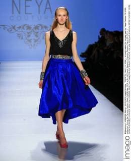 TORONTO, March 15, 2016 -- A model walks the runway wearing Neya Couture FW 2016 collection during the Toronto Fashion Week Fall Winter 2016 at David Pecaut Square in Toronto, Canada, March 15, 2016. ) CANADA-TORONTO-FASHION WEEK-FALL WINTER 2016 ZouxZheng 