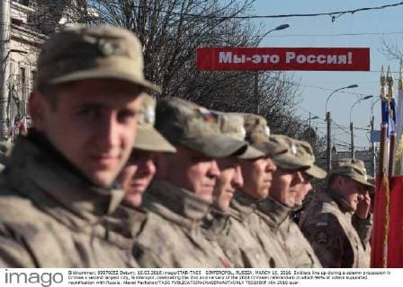 SIMFEROPOL, RUSSIA. MARCH 16, 2016. Soldiers line up during a solemn procession in Crimea s second largest city, Simferopol, celebrating the 2nd anniversary of the 2014 Crimean referendum in which 96% of voters supported reunification with Russia. Alexei Pavlishak TASS  TS019B5F