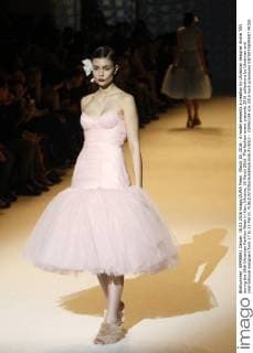 March 18, 2016 - A model presents a creation by Ukrainian designer Andre TAN during the 38th Ukrainian Fashion Week in Kiev, Ukraine, 18 March 2016. The fashion event presents 2016 collections by Ukrainian and international designers from 17 to 23 March. - ZUMAs334