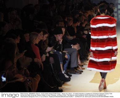 March 18, 2016 - A model presents a creation by Ukrainian designer Andre TAN during the 38th Ukrainian Fashion Week in Kiev, Ukraine, 18 March 2016. The fashion event presents 2016 collections by Ukrainian and international designers from 17 to 23 March. - ZUMAs334