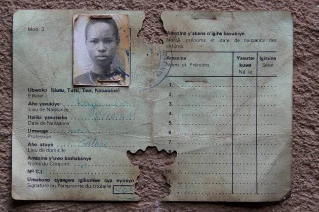 March 13, 2016 - Ntarama, Bugesera, Rwanda - The damaged national identity card of a young woman, whose family name was Uwimana, is displayed at the location of her death: Ntarama Church, which is now the Ntarama Genocide Memorial. According to the memorial site manager, Uwimana was killed on these grounds along with 5,000 other Tutsis on April 15, 1994. During that time national identity cards included the ethnicity of the bearer; after the genocide such ethnic identification was banned by the government. Ntarama Rwanda - ZUMAf76_