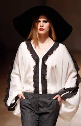 Portugal: Fashion Week A model displays a creation by portuguese designer Nuno Baltazar at his Fall Winter 2016 collection fashion show during Portugal Fashion Week in Porto.  NunoxGuimaraes