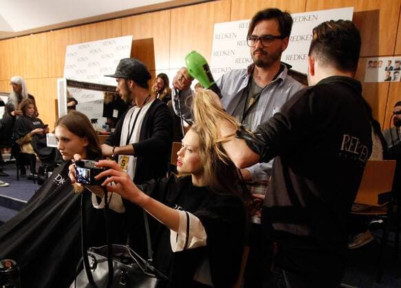 Portugal: Fashion Week A model is made up before her Fall Winter 2016 collection fashion show during Portugal Fashion Week in Porto.  NunoxGuimaraes