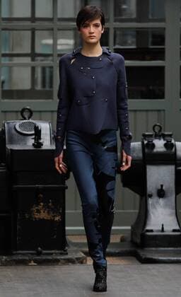PORTUGAL FASHION WEEK A model displays a creation by portuguese designer Luis Buchinho at his Fall Winter 2016 collection fashion show during Portugal Fashion Week in Porto.  NUNOxGUIMARAES