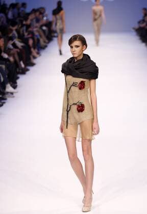 March 21, 2016 - A model presents a creation by Ukrainian designer DESSERTS during the 38th Ukrainian Fashion Week in Kiev, Ukraine, 21 March 2016. The fashion event presents 2016 collections by Ukrainian and international designers from 17 to 23 March. - ZUMAs334