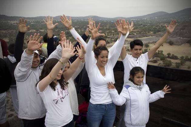 People raise their hands on the Pyramid of the Sun during the celebration of the spring equinox at the archaeological site of Teotihuacan, in the municipality of San Juan Teotihuacan, Mexico, on March 21, 2016. ) MEXICO-SAN JUAN TEOTIHUACAN-CULTURE-SPRING AlejandroxAyala 