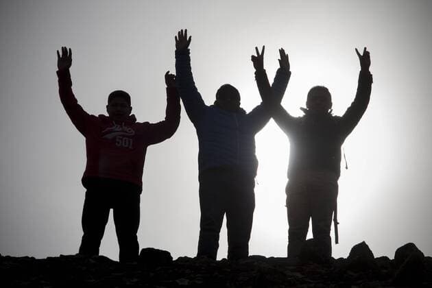 People raise their hands on the Pyramid of the Sun during the celebration of the spring equinox at the archaeological site of Teotihuacan, in the municipality of San Juan Teotihuacan, Mexico, on March 21, 2016. ) MEXICO-SAN JUAN TEOTIHUACAN-CULTURE-SPRING AlejandroxAyala 