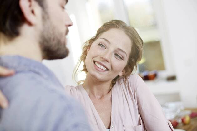 Affectionate couple in kitchen model released Symbolfoto property released  FMKF002364