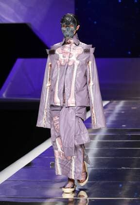 BEIJING, CHINA - MARCH 25: (CHINA OUT) A model showcases designs on the runway at Hempel Award - the 24th China International Young Fashion Designers Contest during day one of the Mercedes-Benz China Fashion Week A W 16 17 Collection at Beijing Hotel on March 25, 2016 in Beijing, China.  CFP481722762