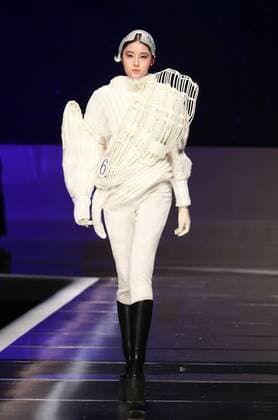 BEIJING, CHINA - MARCH 25: (CHINA OUT) A model showcases designs on the runway at Hempel Award - the 24th China International Young Fashion Designers Contest during day one of the Mercedes-Benz China Fashion Week A W 16 17 Collection at Beijing Hotel on March 25, 2016 in Beijing, China.  CFP481722763