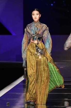 BEIJING, CHINA - MARCH 25: (CHINA OUT) A model showcases designs on the runway at Hempel Award - the 24th China International Young Fashion Designers Contest during day one of the Mercedes-Benz China Fashion Week A W 16 17 Collection at Beijing Hotel on March 25, 2016 in Beijing, China.  CFP481722766