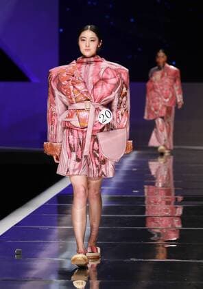 BEIJING, CHINA - MARCH 25: (CHINA OUT) A model showcases designs on the runway at Hempel Award - the 24th China International Young Fashion Designers Contest during day one of the Mercedes-Benz China Fashion Week A W 16 17 Collection at Beijing Hotel on March 25, 2016 in Beijing, China.  CFP481722770