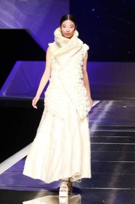 BEIJING, CHINA - MARCH 25: (CHINA OUT) A model showcases designs on the runway at Hempel Award - the 24th China International Young Fashion Designers Contest during day one of the Mercedes-Benz China Fashion Week A W 16 17 Collection at Beijing Hotel on March 25, 2016 in Beijing, China.  CFP481722778