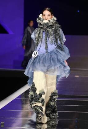 BEIJING, CHINA - MARCH 25: (CHINA OUT) A model showcases designs on the runway at Hempel Award - the 24th China International Young Fashion Designers Contest during day one of the Mercedes-Benz China Fashion Week A W 16 17 Collection at Beijing Hotel on March 25, 2016 in Beijing, China.  CFP481722775