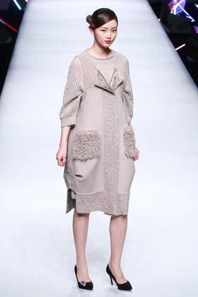 BEIJING, CHINA - MARCH 26: (CHINA OUT) A model showcases designs on the runway at POLY BRIGHT Collection during the Mercedes-Benz China Fashion Week Autumn Winter 2016 2017 at Beijing Hotel on March 26, 2016 in Beijing, China.  CFP481740029