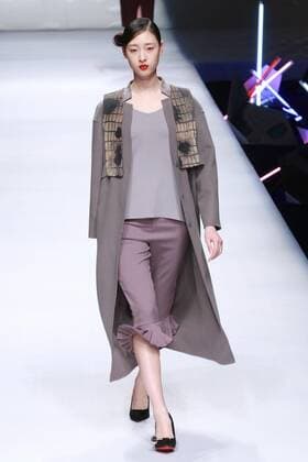 BEIJING, CHINA - MARCH 26: (CHINA OUT) A model showcases designs on the runway at POLY BRIGHT Collection during the Mercedes-Benz China Fashion Week Autumn Winter 2016 2017 at Beijing Hotel on March 26, 2016 in Beijing, China.  CFP481740033