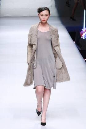 BEIJING, CHINA - MARCH 26: (CHINA OUT) A model showcases designs on the runway at POLY BRIGHT Collection during the Mercedes-Benz China Fashion Week Autumn Winter 2016 2017 at Beijing Hotel on March 26, 2016 in Beijing, China.  CFP481740036