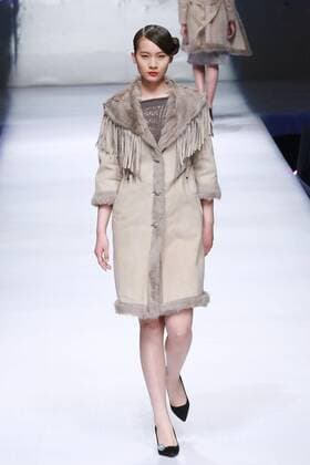 BEIJING, CHINA - MARCH 26: (CHINA OUT) A model showcases designs on the runway at POLY BRIGHT Collection during the Mercedes-Benz China Fashion Week Autumn Winter 2016 2017 at Beijing Hotel on March 26, 2016 in Beijing, China.  CFP481740040