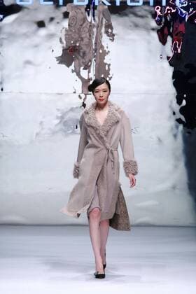 BEIJING, CHINA - MARCH 26: (CHINA OUT) A model showcases designs on the runway at POLY BRIGHT Collection during the Mercedes-Benz China Fashion Week Autumn Winter 2016 2017 at Beijing Hotel on March 26, 2016 in Beijing, China.  CFP481740045