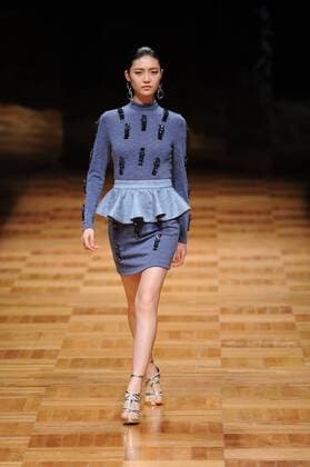 BEIJING, CHINA - MARCH 26: (CHINA OUT) A model showcases designs on the runway at Asahi Kasei Chinese Fashion Designer Creativity Award - Liu Sicong Collection during the Mercedes-Benz China Fashion Week Autumn Winter 2016 2017 at Beijing Hotel on March 26, 2016 in Beijing, China.  CFP481757740