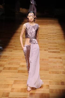 BEIJING, CHINA - MARCH 26: (CHINA OUT) A model showcases designs on the runway at Asahi Kasei Chinese Fashion Designer Creativity Award - Liu Sicong Collection during the Mercedes-Benz China Fashion Week Autumn Winter 2016 2017 at Beijing Hotel on March 26, 2016 in Beijing, China.  CFP481757743