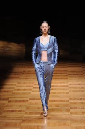 BEIJING, CHINA - MARCH 26: (CHINA OUT) A model showcases designs on the runway at Asahi Kasei Chinese Fashion Designer Creativity Award - Liu Sicong Collection during the Mercedes-Benz China Fashion Week Autumn Winter 2016 2017 at Beijing Hotel on March 26, 2016 in Beijing, China.  CFP481757751