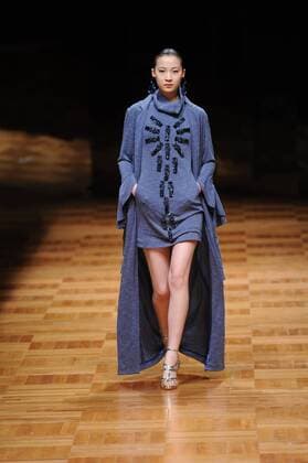 BEIJING, CHINA - MARCH 26: (CHINA OUT) A model showcases designs on the runway at Asahi Kasei Chinese Fashion Designer Creativity Award - Liu Sicong Collection during the Mercedes-Benz China Fashion Week Autumn Winter 2016 2017 at Beijing Hotel on March 26, 2016 in Beijing, China.  CFP481757752