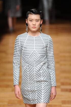 BEIJING, CHINA - MARCH 26: (CHINA OUT) A model showcases designs on the runway at Asahi Kasei Chinese Fashion Designer Creativity Award - Liu Sicong Collection during the Mercedes-Benz China Fashion Week Autumn Winter 2016 2017 at Beijing Hotel on March 26, 2016 in Beijing, China.  CFP481757750