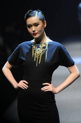 BEIJING, CHINA - MARCH 26: (CHINA OUT) A model showcases designs on the runway at HMR Collection during the Mercedes-Benz China Fashion Week Autumn Winter 2016 2017 at 751D.Park on March 26, 2016 in Beijing, China.  CFP481765103