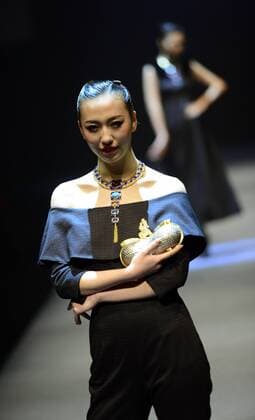 BEIJING, CHINA - MARCH 26: (CHINA OUT) A model showcases designs on the runway at HMR Collection during the Mercedes-Benz China Fashion Week Autumn Winter 2016 2017 at 751D.Park on March 26, 2016 in Beijing, China.  CFP481765100