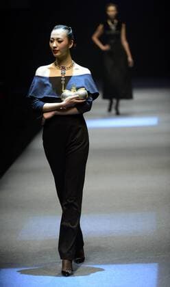 BEIJING, CHINA - MARCH 26: (CHINA OUT) A model showcases designs on the runway at HMR Collection during the Mercedes-Benz China Fashion Week Autumn Winter 2016 2017 at 751D.Park on March 26, 2016 in Beijing, China.  CFP481765101