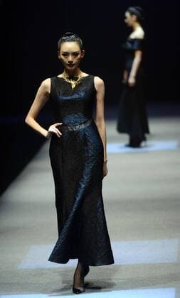 BEIJING, CHINA - MARCH 26: (CHINA OUT) A model showcases designs on the runway at HMR Collection during the Mercedes-Benz China Fashion Week Autumn Winter 2016 2017 at 751D.Park on March 26, 2016 in Beijing, China.  CFP481765102