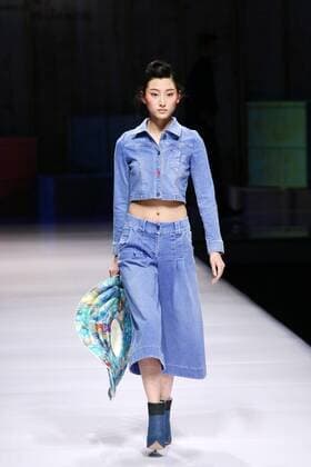 BEIJING, CHINA - MARCH 27: (CHINA OUT) A model showcases designs on the runway at d nim Collection during the Mercedes-Benz China Fashion Week Autumn Winter 2016 2017 at Beijing Hotel on March 27, 2016 in Beijing, China.  CFP481773996