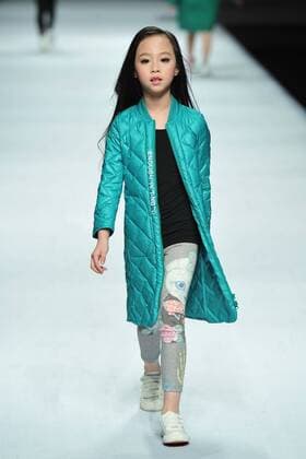 BEIJING, CHINA - MARCH 27: (CHINA OUT) A model showcases designs on the runway at Ting Zu Collection during the Mercedes-Benz China Fashion Week Autumn Winter 2016 2017 at Beijing Hotel on March 27, 2016 in Beijing, China.  CFP481774075