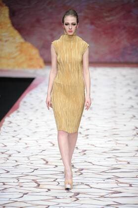 BEIJING, CHINA - MARCH 27: (CHINA OUT) A model showcases designs on the runway at Tao LouLan Collection during the Mercedes-Benz China Fashion Week Autumn Winter 2016 2017 at 751D.Park on March 27, 2016 in Beijing, China.  CFP481794484
