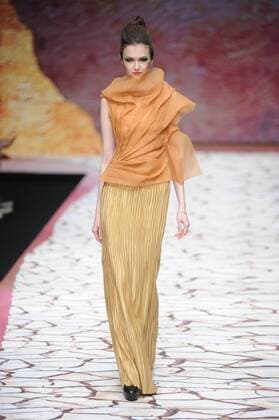 BEIJING, CHINA - MARCH 27: (CHINA OUT) A model showcases designs on the runway at Tao LouLan Collection during the Mercedes-Benz China Fashion Week Autumn Winter 2016 2017 at 751D.Park on March 27, 2016 in Beijing, China.  CFP481794489
