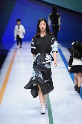 BEIJING, CHINA - MARCH 27: (CHINA OUT) A model showcases designs on the runway at COMME TU ES Collection during the Mercedes-Benz China Fashion Week Autumn Winter 2016 2017 at Beijing Hotel on March 27, 2016 in Beijing, China.  CFP481794506