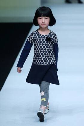 BEIJING, CHINA - MARCH 27: (CHINA OUT) A model showcases designs on the runway at IVAN & NICOLE Collection designed by Yang Shan during the Mercedes-Benz China Fashion Week Autumn Winter 2016 2017 at 751D.Park on March 27, 2016 in Beijing, China.  CFP481794630