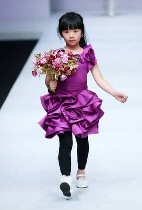 BEIJING, CHINA - MARCH 27: (CHINA OUT) A model showcases designs on the runway at IVAN & NICOLE Collection designed by Yang Shan during the Mercedes-Benz China Fashion Week Autumn Winter 2016 2017 at 751D.Park on March 27, 2016 in Beijing, China.  CFP481794631