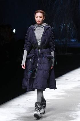 BEIJING, CHINA - MARCH 28: (CHINA OUT) A model showcases designs on the runway at BOSIDENG Collection during the Mercedes-Benz China Fashion Week Autumn Winter 2016 2017 at Beijing Hotel on March 28, 2016 in Beijing, China.  CFP481829668