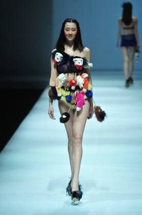 BEIJING, CHINA - MARCH 28: (CHINA OUT) A model showcases designs on the runway at XEFIEE Collection during the Mercedes-Benz China Fashion Week Autumn Winter 2016 2017 at 751D.Park on March 28, 2016 in Beijing, China.  CFP481829610
